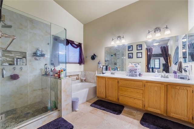 7517 Elk Meadows Ct, Las Vegas, NV 89131 - bathroom featuring a shower stall, a garden tub, double vanity, and tile patterned flooring