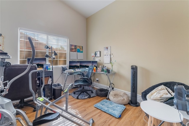 7517 Elk Meadows Ct, Las Vegas, NV 89131 - office area featuring wood finished floors and high vaulted ceiling