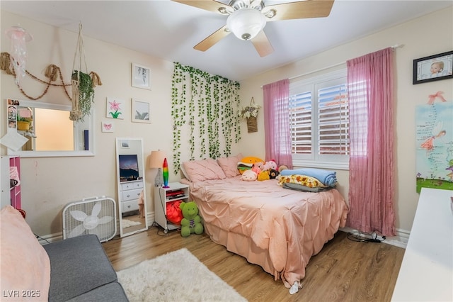 7517 Elk Meadows Ct, Las Vegas, NV 89131 - bedroom featuring wood finished floors and a ceiling fan