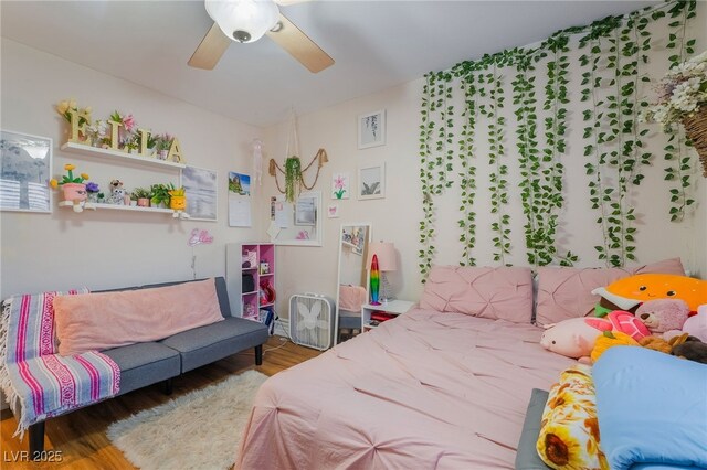 7517 Elk Meadows Ct, Las Vegas, NV 89131 - bedroom featuring wood finished floors and ceiling fan