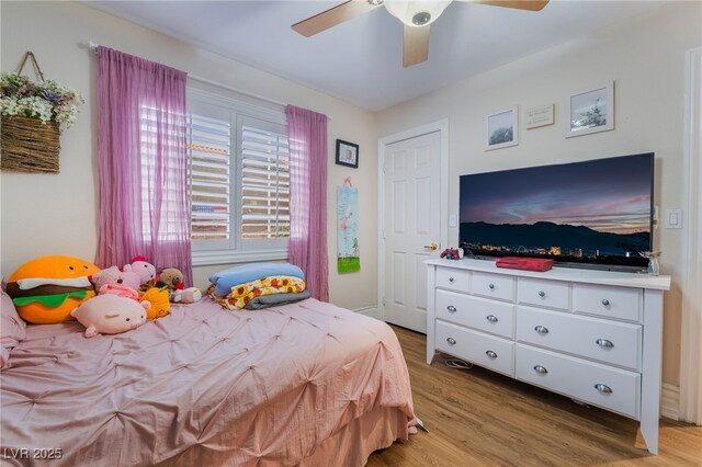 7517 Elk Meadows Ct, Las Vegas, NV 89131 - bedroom featuring light wood-style flooring and a ceiling fan