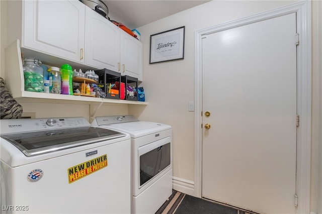 7517 Elk Meadows Ct, Las Vegas, NV 89131 - laundry area featuring washing machine and dryer and cabinet space