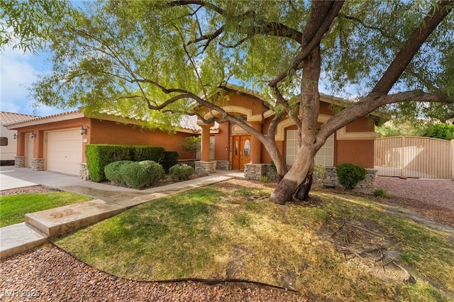7517 Elk Meadows Ct, Las Vegas, NV 89131 - view of front of home with stone siding, stucco siding, and a garage