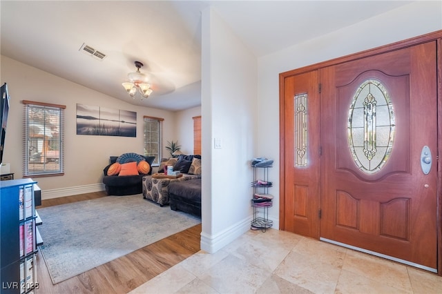 7517 Elk Meadows Ct, Las Vegas, NV 89131 - foyer entrance featuring vaulted ceiling and light wood-style floors