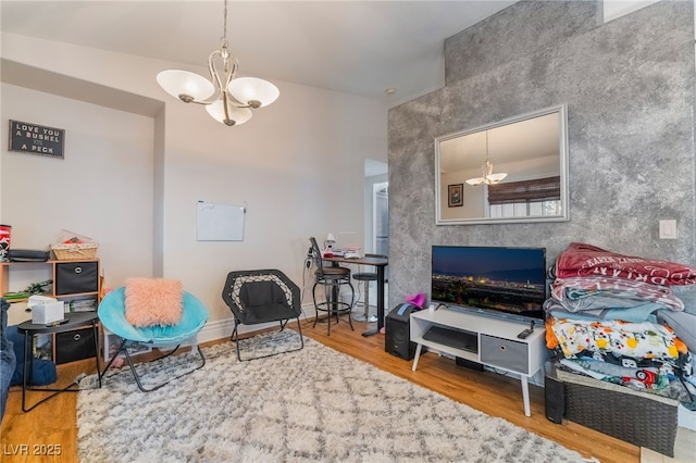 7517 Elk Meadows Ct, Las Vegas, NV 89131 - living room featuring a chandelier and wood finished floors