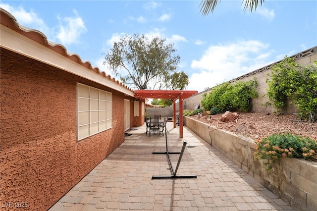 7517 Elk Meadows Ct, Las Vegas, NV 89131 - fenced backyard featuring outdoor dining area and a patio