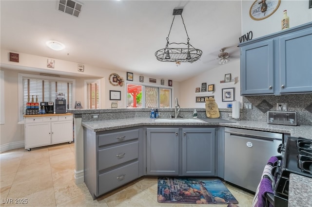 7517 Elk Meadows Ct, Las Vegas, NV 89131 - kitchen with a peninsula, dishwasher, healthy amount of natural light, and gas stove