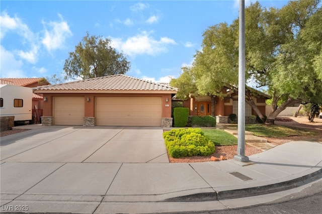 7517 Elk Meadows Ct, Las Vegas, NV 89131 - view of front of property with stone siding, stucco siding, a tile roof, and driveway