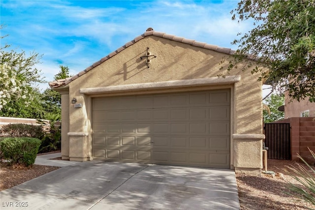 3005 Dotted Wren Ave, North Las Vegas, NV 89084 - garage featuring concrete driveway