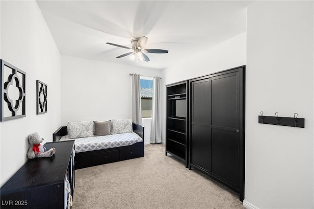 3568 E Malheur Ave, Pahrump, NV 89061 - bedroom with light carpet and a ceiling fan