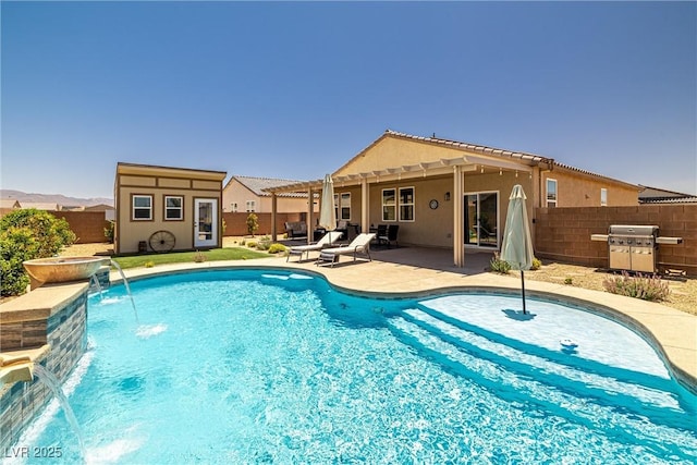 3568 E Malheur Ave, Pahrump, NV 89061 - view of swimming pool featuring grilling area, a patio area, and a fenced backyard