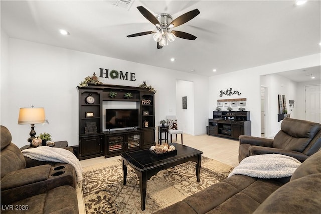 3568 E Malheur Ave, Pahrump, NV 89061 - living area with a ceiling fan, light wood-style floors, and recessed lighting