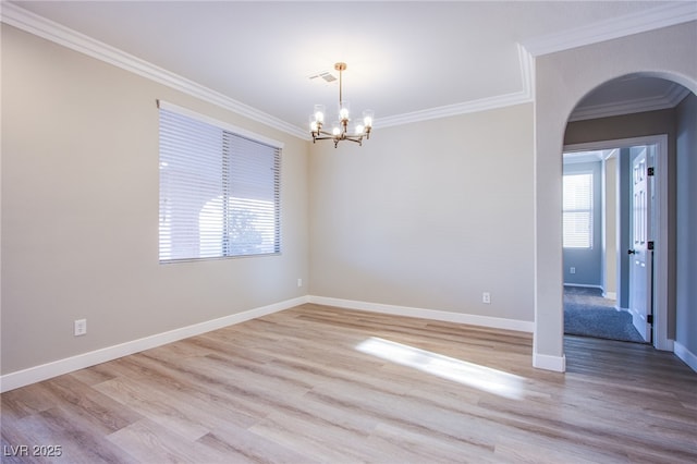 8026 Sunset Creek St, Las Vegas, NV 89113 - unfurnished room with ornamental molding, arched walkways, a chandelier, and light wood-style flooring