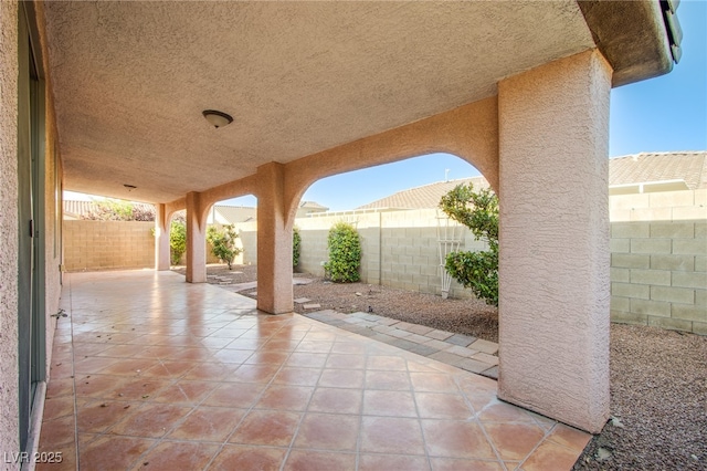 8026 Sunset Creek St, Las Vegas, NV 89113 - fenced backyard featuring a patio