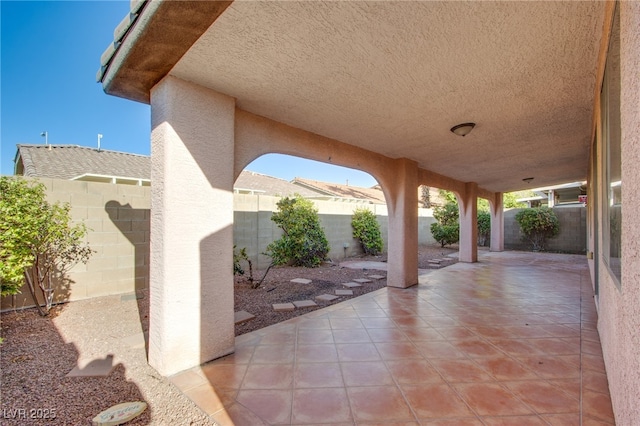 8026 Sunset Creek St, Las Vegas, NV 89113 - fenced backyard with a patio