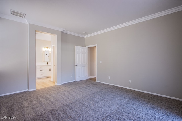 8026 Sunset Creek St, Las Vegas, NV 89113 - unfurnished bedroom with light carpet, crown molding, and ensuite bath