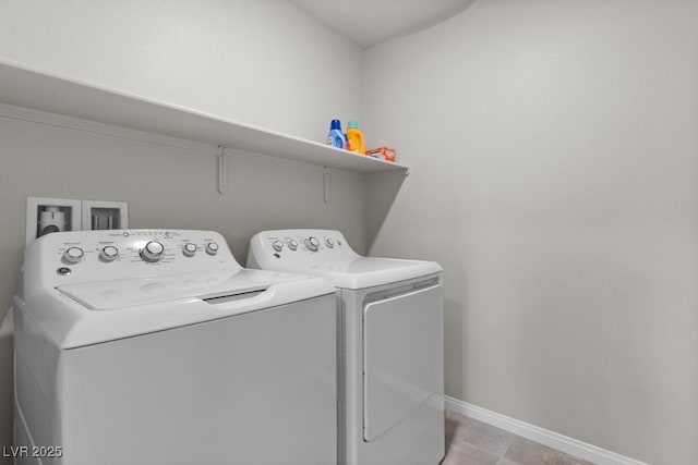 4498 Lantern Point Ave, North Las Vegas, NV 89084 - laundry room with washing machine and clothes dryer and light tile patterned floors