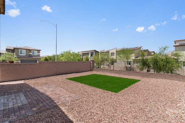 4498 Lantern Point Ave, North Las Vegas, NV 89084 - fenced backyard featuring a residential view and a patio area
