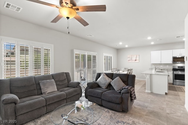 4498 Lantern Point Ave, North Las Vegas, NV 89084 - living room featuring recessed lighting and a ceiling fan