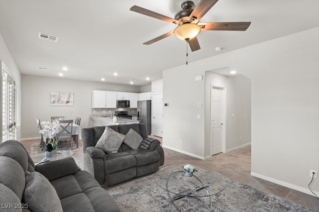 4498 Lantern Point Ave, North Las Vegas, NV 89084 - living area with a ceiling fan, recessed lighting, and tile patterned flooring