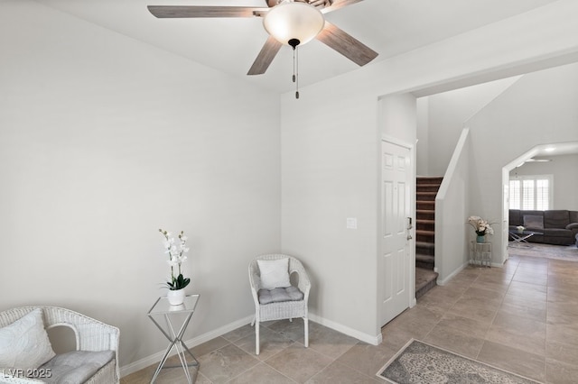 4498 Lantern Point Ave, North Las Vegas, NV 89084 - living area with stairs, ceiling fan, and tile patterned floors