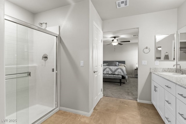 4498 Lantern Point Ave, North Las Vegas, NV 89084 - full bathroom with vanity, ensuite bath, a shower stall, and a ceiling fan