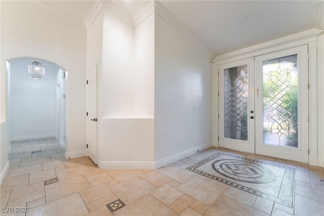4014 Trapani Pl, Las Vegas, NV 89141 - entryway featuring arched walkways, french doors, ornamental molding, and a chandelier