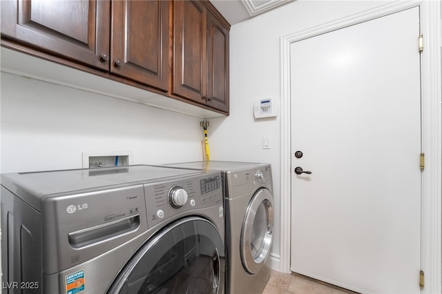 4014 Trapani Pl, Las Vegas, NV 89141 - laundry room featuring cabinet space, separate washer and dryer, and light tile patterned flooring