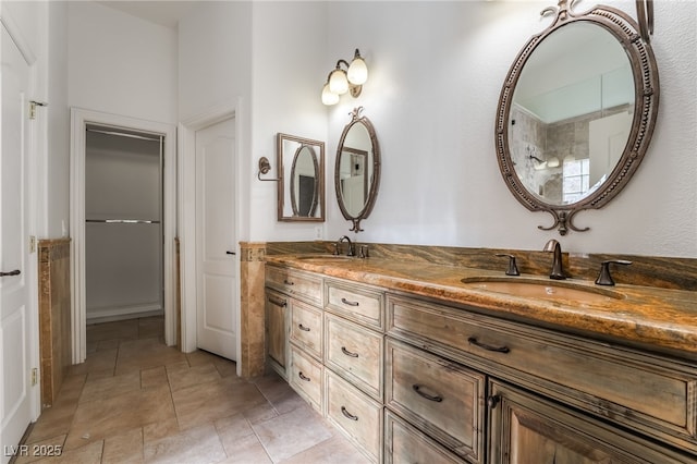 4014 Trapani Pl, Las Vegas, NV 89141 - full bathroom with double vanity and stone finish flooring