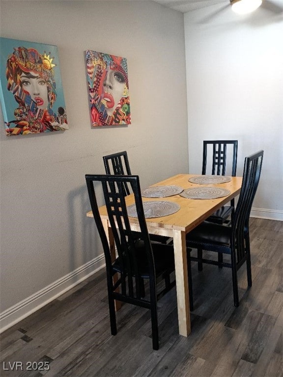1515 E Reno Ave Unit D202, Las Vegas, NV 89119 - dining space featuring dark wood-style floors and baseboards