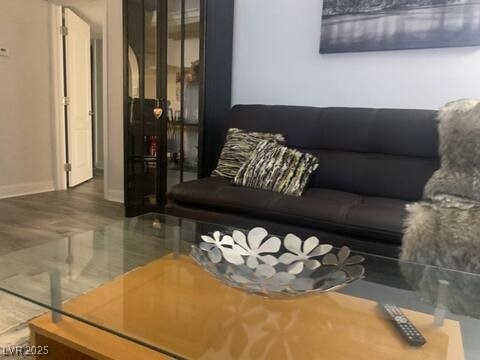 1515 E Reno Ave Unit D202, Las Vegas, NV 89119 - living room featuring baseboards