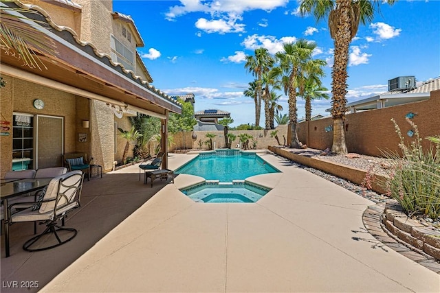 2042 Maple Springs St, Henderson, NV 89002 - view of pool with a patio, a fenced backyard, and a pool with connected hot tub