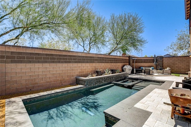 6897 Linda Creek Ct, Las Vegas, NV 89178 - view of swimming pool featuring outdoor lounge area, a fenced backyard, and a patio area