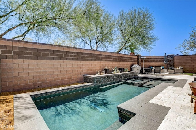 6897 Linda Creek Ct, Las Vegas, NV 89178 - view of pool featuring a fenced backyard, an outdoor hangout area, a patio, and a pool with connected hot tub