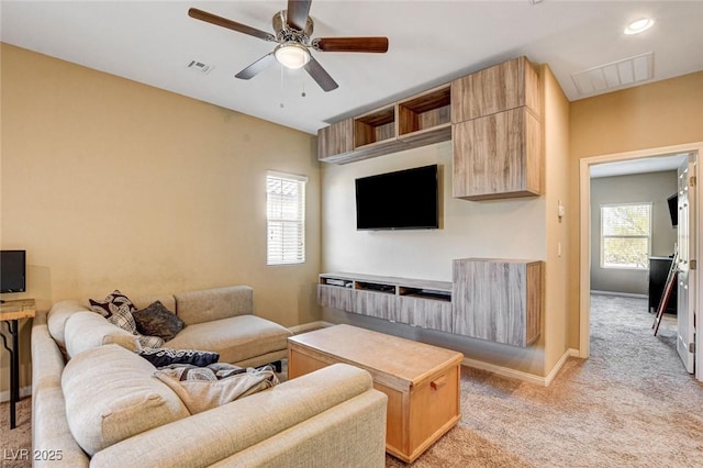 6897 Linda Creek Ct, Las Vegas, NV 89178 - living room with light carpet and ceiling fan