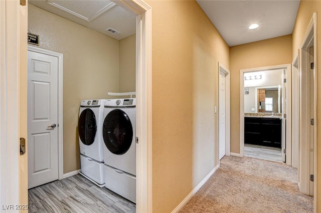 6897 Linda Creek Ct, Las Vegas, NV 89178 - washroom featuring separate washer and dryer and attic access