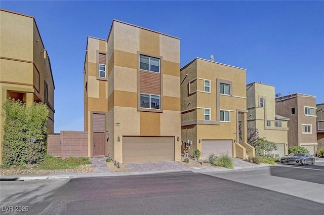 3908 Total Eclipse St, Las Vegas, NV 89129 - view of property featuring a garage and a residential view
