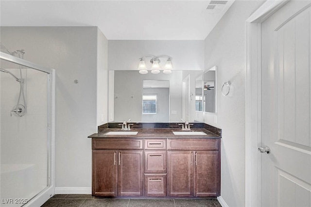 3908 Total Eclipse St, Las Vegas, NV 89129 - full bath with a stall shower, double vanity, and granite floors
