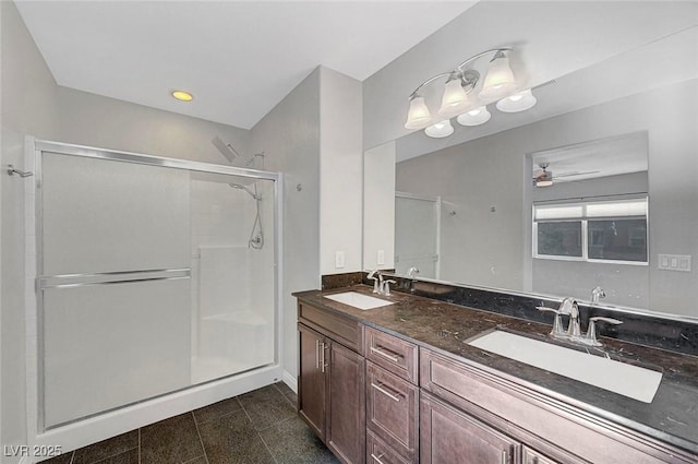 3908 Total Eclipse St, Las Vegas, NV 89129 - full bathroom featuring a shower stall, double vanity, and a ceiling fan
