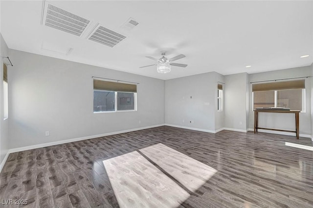 3908 Total Eclipse St, Las Vegas, NV 89129 - empty room with wood finished floors, a ceiling fan, recessed lighting, and attic access