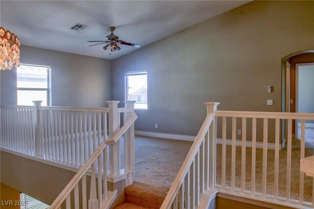 72 Broken Putter Way, Las Vegas, NV 89148 - stairway featuring carpet, ceiling fan, and arched walkways