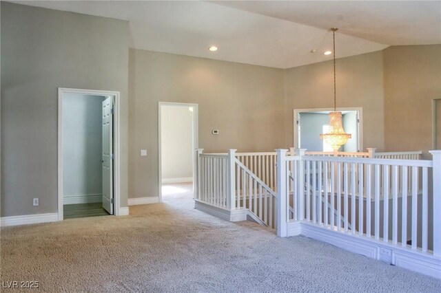 72 Broken Putter Way, Las Vegas, NV 89148 - spare room with carpet, a chandelier, and high vaulted ceiling