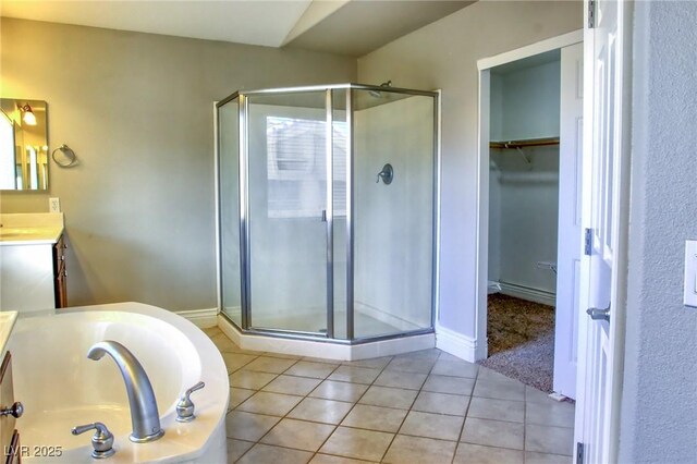 72 Broken Putter Way, Las Vegas, NV 89148 - full bath with a shower stall, vanity, a bath, and tile patterned floors