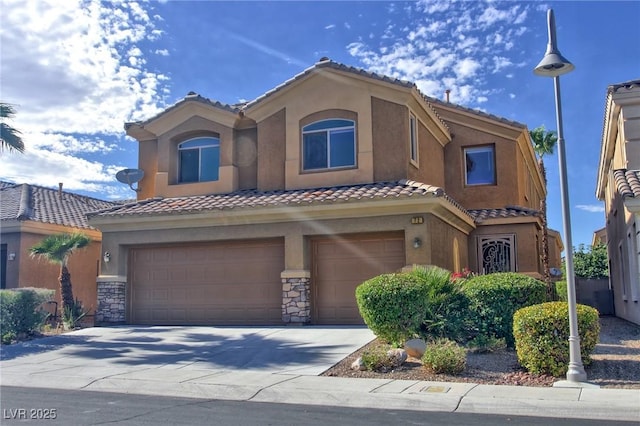 72 Broken Putter Way, Las Vegas, NV 89148 - view of front facade featuring a garage, a tile roof, stucco siding, concrete driveway, and stone siding