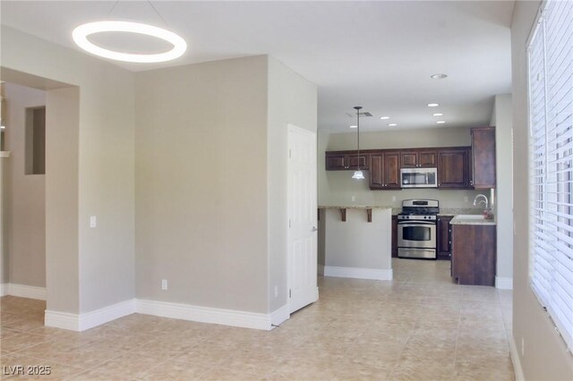 72 Broken Putter Way, Las Vegas, NV 89148 - tiled entrance foyer with a towering ceiling and stairway