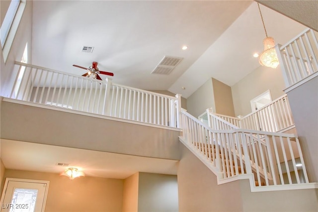 72 Broken Putter Way, Las Vegas, NV 89148 - stairway featuring high vaulted ceiling, ceiling fan, and recessed lighting