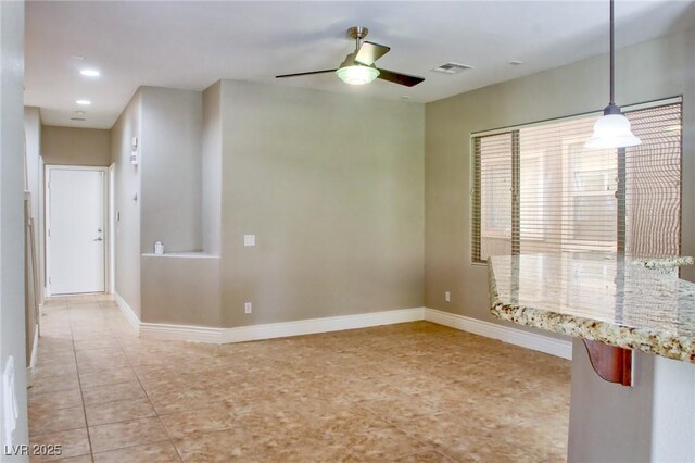 72 Broken Putter Way, Las Vegas, NV 89148 - unfurnished room featuring light tile patterned floors and ceiling fan