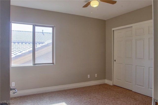 72 Broken Putter Way, Las Vegas, NV 89148 - unfurnished bedroom featuring light carpet, a closet, and a ceiling fan
