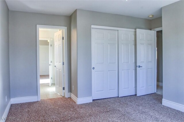 72 Broken Putter Way, Las Vegas, NV 89148 - unfurnished bedroom featuring carpet and a closet