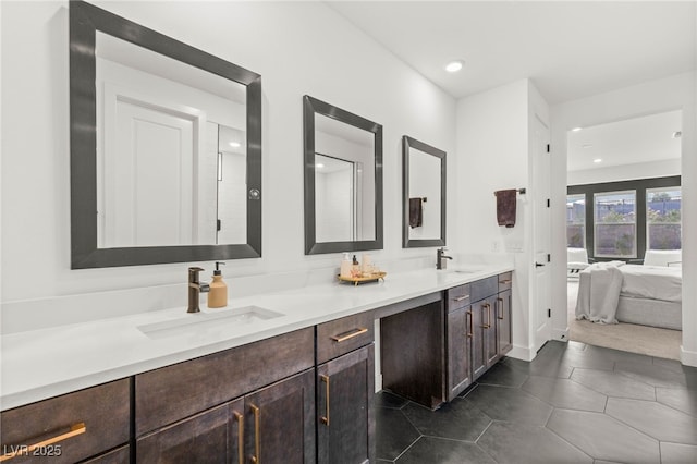 389 Red Feather Peak Ct, Las Vegas, NV 89138 - full bath with double vanity, ensuite bath, recessed lighting, and tile patterned floors